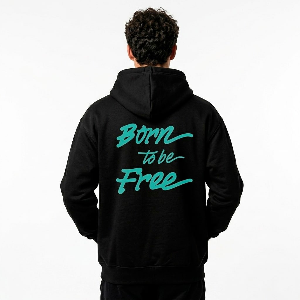 Chico de espaldas con sudadera con la frase born to be free
